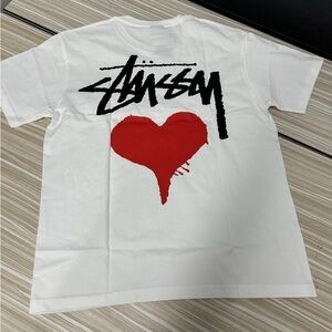 Stussy White Tee with Black Logo and Red Heart Graphic